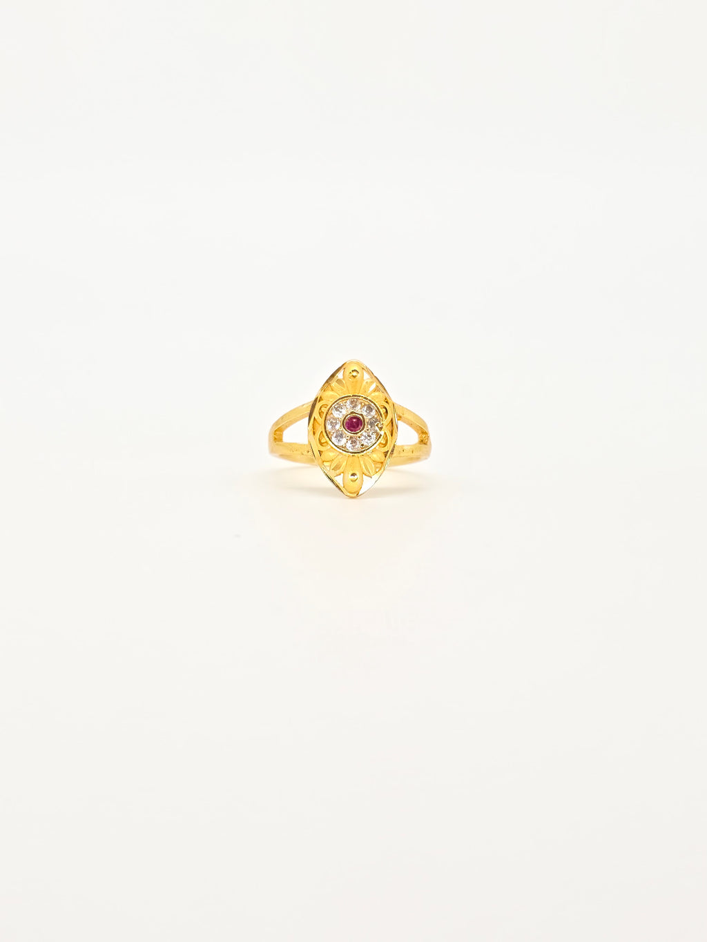 Gold ring with a gemstone on a white background